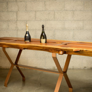 Two Wine Bottles placed on Whitworth Table