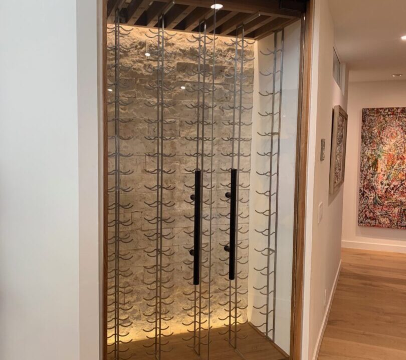 Laser-cut brushed stainless steel bottle cradles