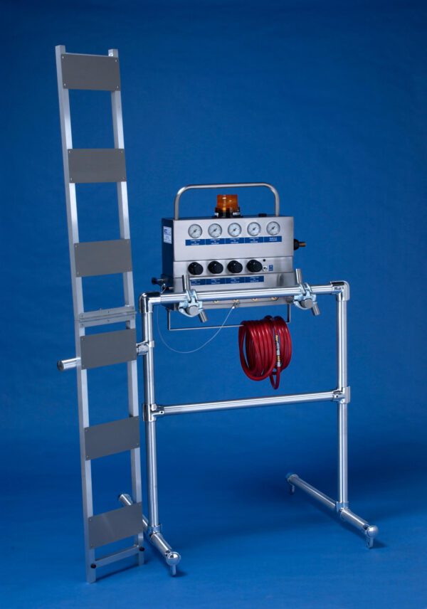 A ladder with hoses and a fire extinguisher.